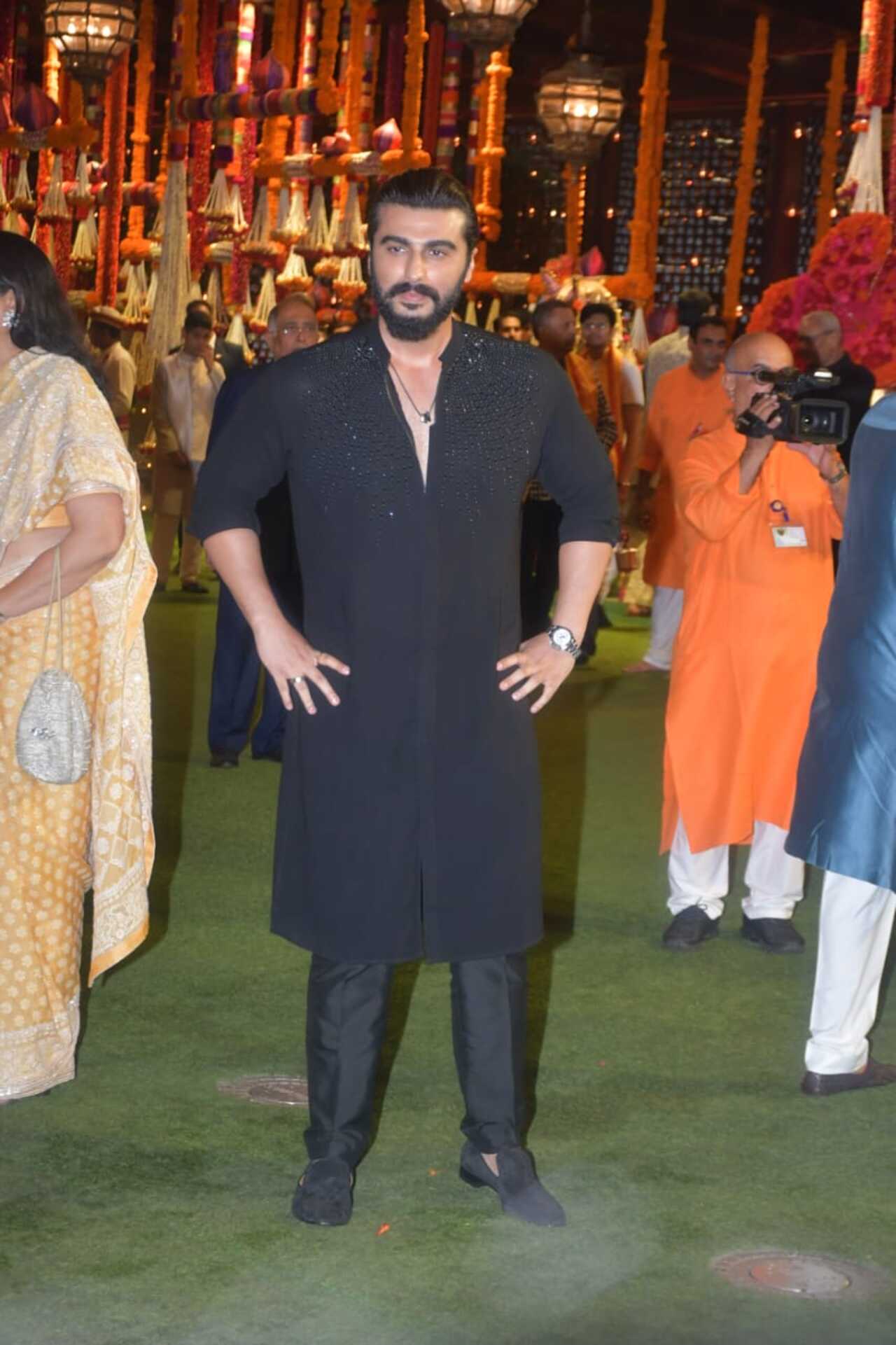 Arjun Kapoor was at the puja last evening. He wore a simple black kurta